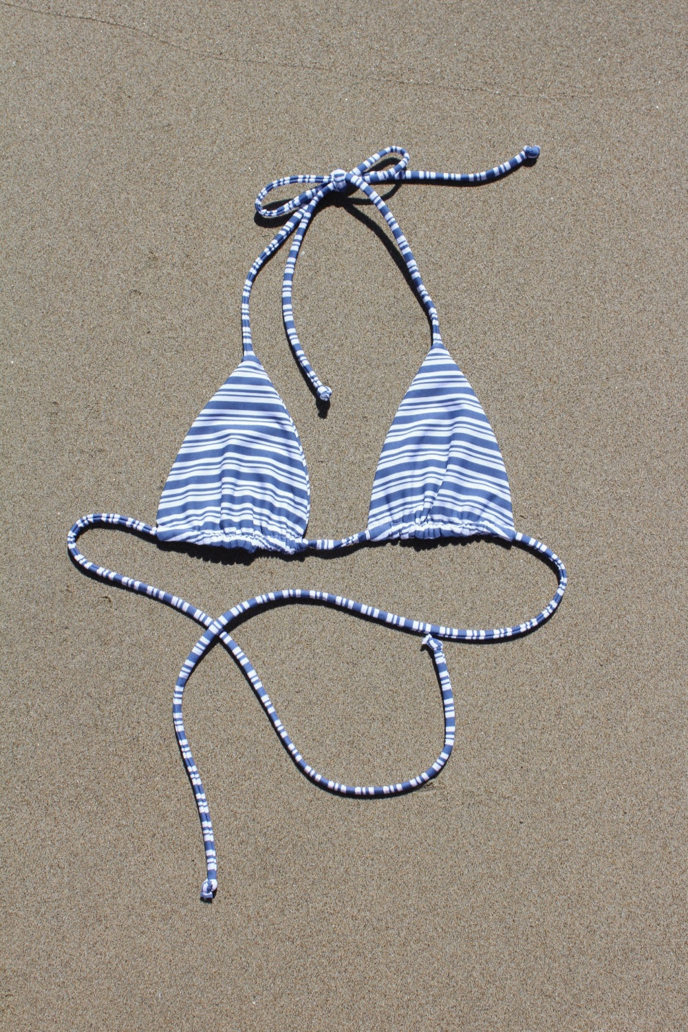 Nautical-inspired blue striped bikini top